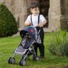 image of a boy pushing a checked dolls pushchair