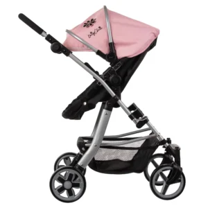 Daisy Chain Connect Dolls Pram in Classic Pink fabric. Shown in pushchair mode shown on a side angle with the handle to the left side. Hood is up and is pink with accents of Silver metal with a black and pink flower rosette and an with an embroidered Daisy Chain logo in silver. Wheels are black and Silver with a shopping basket at bottom of pushchair which is black. The frame of the pushchair is silver.