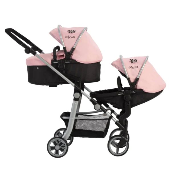 Daisy Chain Pinnacle Double Dolls Pram in Pink fabric for ages 6-13 years old. The pram has a silver frame with black accents. Cot has a black fabric body and pushchair seat has a black body. Both the cot and seat have hoods which are pink with a black and pink daisy that is removable. The cot has a pink apron.