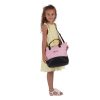 image of a girl in a yellow dress holding a pink baby doll changing bag
