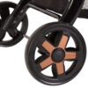 close up image of the daisy chain connect 5 in 1 dolls pram wheels that have rose gold in the centre of them