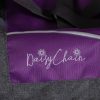 close up image of the daisy chain little zipp dolls pushchair in lavender showing the daisy chain logo