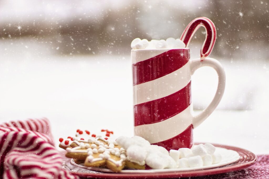 am image of hot chocolate in a candy cane striped mug