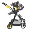 Daisy Chain Connect Dolls Pram shown side on in pushchair mode with handle on the left. Bumblebee fabric, black frame and yellow accents on the frame and wheels.