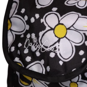 Daisy Chain shoulder bag in bumblebee fabric with a black shoulder strap and black trim. White embroidered Daisy Chain logo.