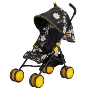 Daisy Chain Little Zipp Dolls Pushchair in Bumblebee fabric shown on an angle with the handles on the right side. Hood is partly up and is mainly black with bumblebee fabric at the back. Seat has black centre with bumblebee fabric around the edge. Wheels are yellow and shopping basket at bottom of pushchair is black