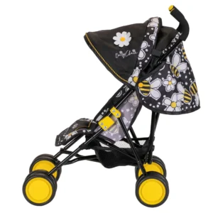 Daisy Chain Little Zipp Dolls Pushchair in Bumblebee fabric shown side on with the handles on the right side. Hood is partly up and is mainly black with bumblebee fabric at the back. Wheels are yellow and shopping basket at bottom of pushchair is black