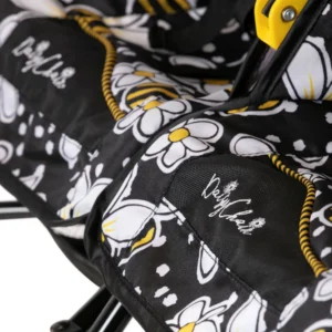 Daisy Chain Zipp Twin Max Dolls Pushchair in Bumblebee fabric. Close up of handles of seats in bumblebee fabric with white embroidered Daisy Chain logo on the front of the seats.
