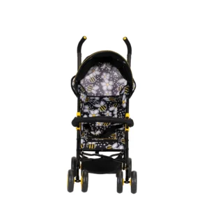 Daisy Chain Zipp Zenith Dolls Pushchair in Bumblebee fabric shown head on with the handles at the back. Hood is mainly black with bumblebee fabric at the back. Seat is in bumblebee fabric with a black bumper bar across the front of the seat. Wheels are yellow with black tyres and shopping basket at bottom of pushchair is black as is the frame of the pushchair.