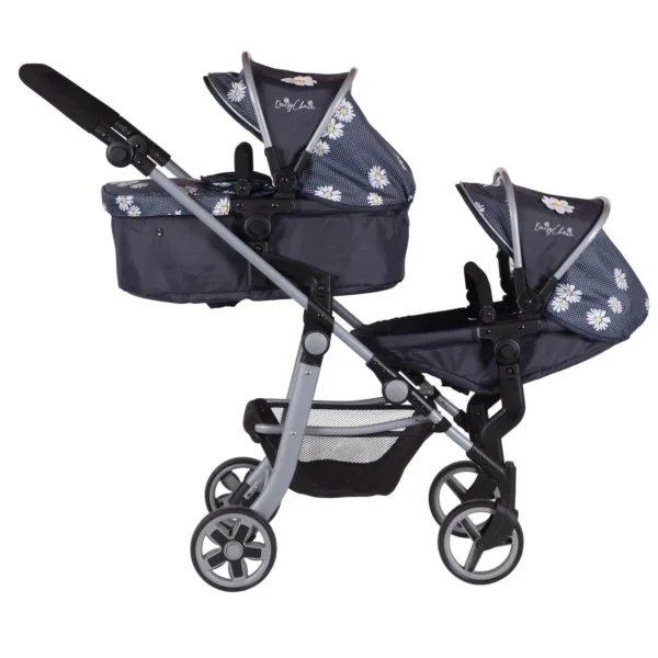 Daisy Chain Pinnacle Double Dolls Pram in Daisy Dot fabric for ages 6-13 years old. Hood is up and is mainly navy blue with accents of daisy's and white polka dots Silver metal with a white and yellow flower rosette and an with an embroidered Daisy Chain logo in white. There is a cot on the top part of the pram and a pushchair seat on the bottom. Wheels are black and Silver with a shopping basket at bottom of pushchair which is black. The frame of the pushchair is silver.