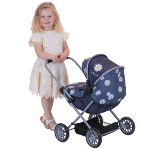 image of a girl with the daisy dot pocket dolls pram